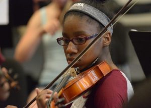 young woman playing violin
